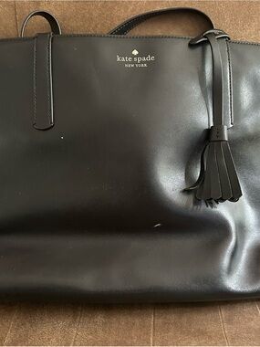 kate spade black  tote with tassel